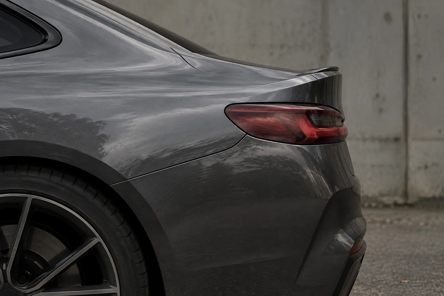 Rear corner and taillight of a graphite performance car